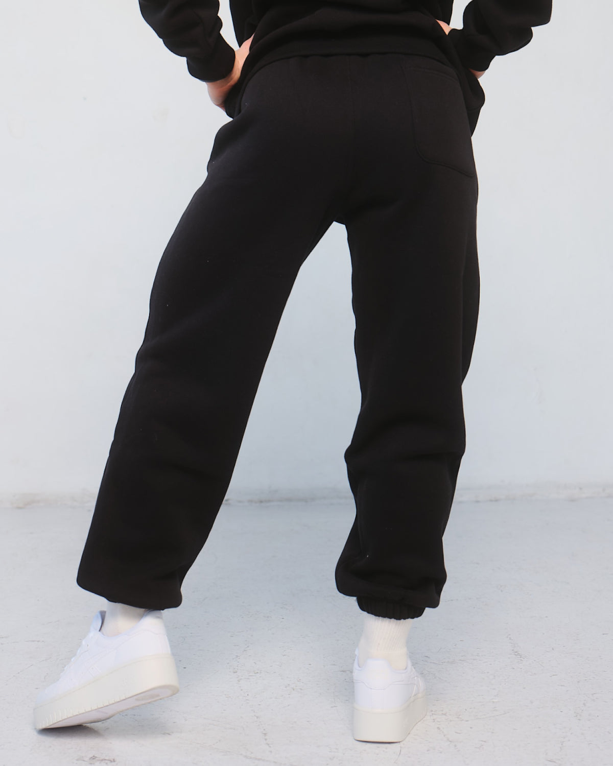 Trackpant for Women in Black – Tapered Leg, Adjustable Waistband, Soft Breathable Fabric for Comfort & Style