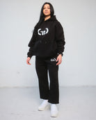 Trackpant for Women in Black – Tapered Leg, Adjustable Waistband, Soft Breathable Fabric for Comfort & Style